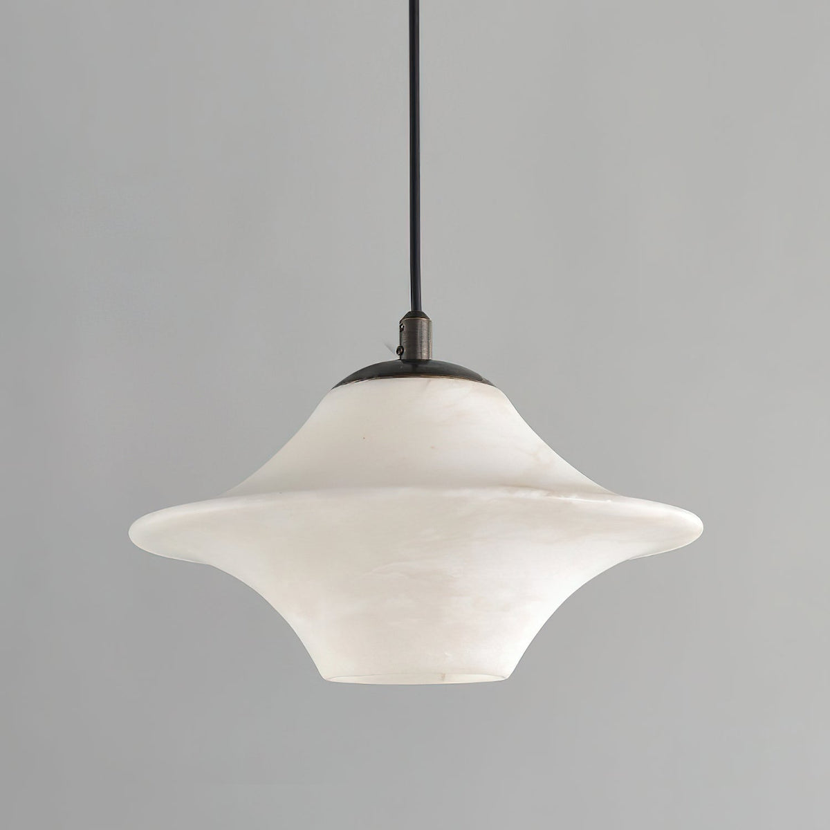 The medium size (8.7 inch) Beckett Alabaster Pendant Light.