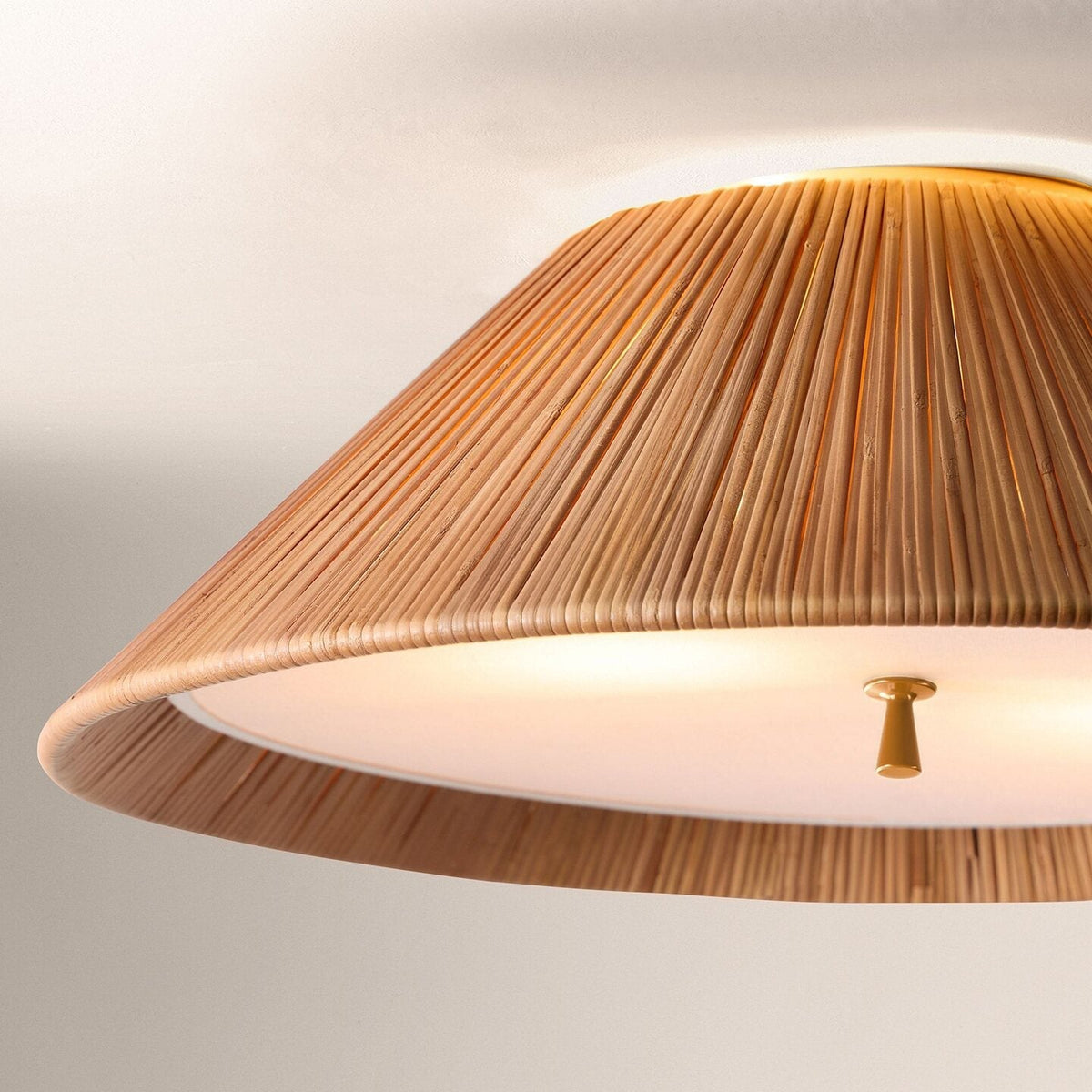 The Bodie Ceiling Mount shown illuminated, casting a warm glow.