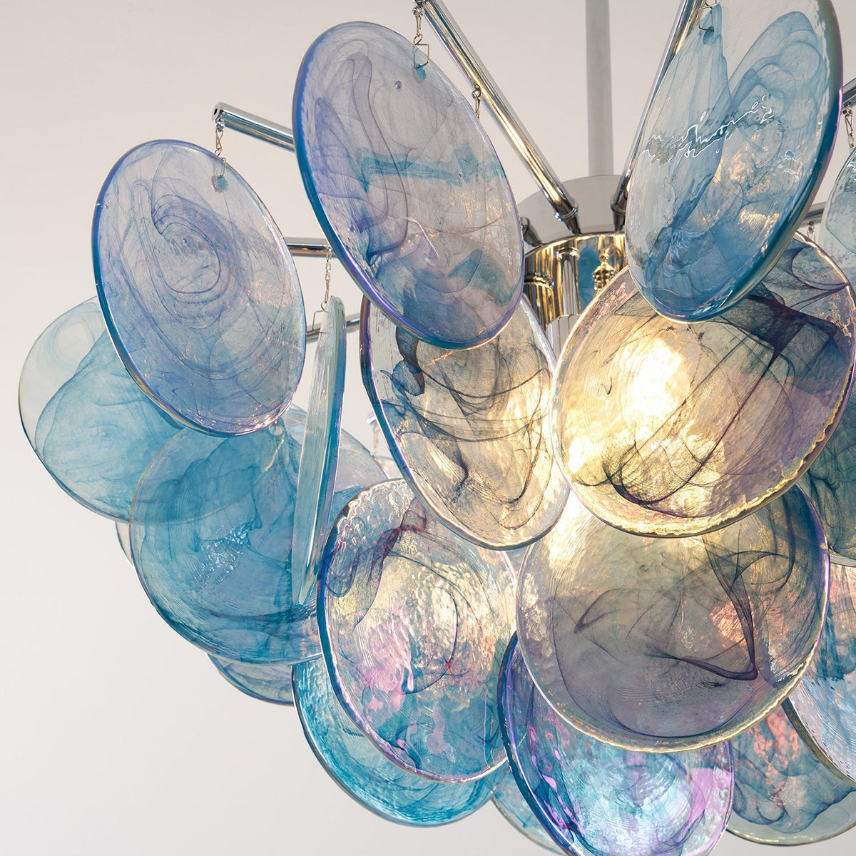 A full display of all available colors of the Camisa Chandelier.