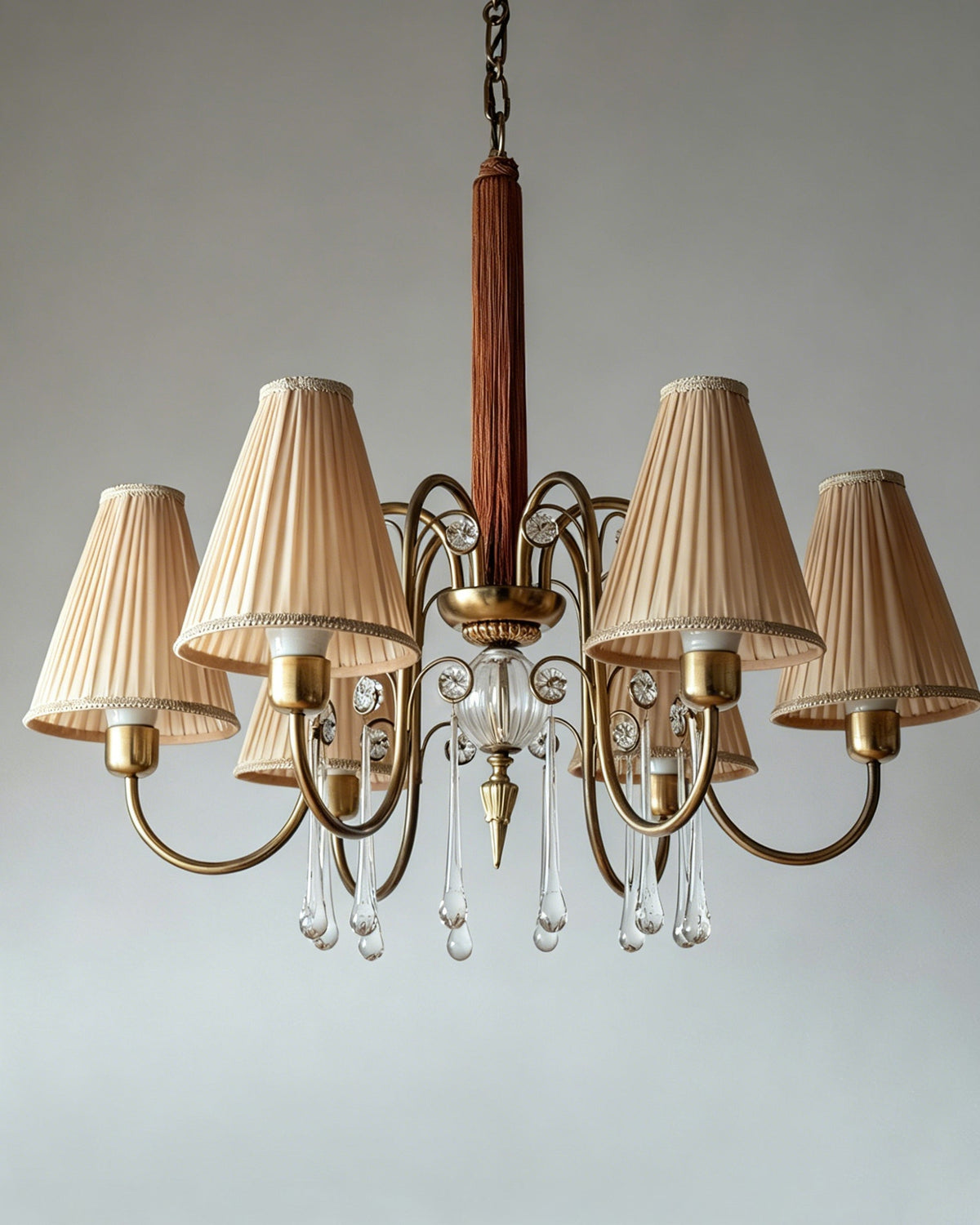 Lifestyle image of the chandelier in a luxurious master bedroom setting.