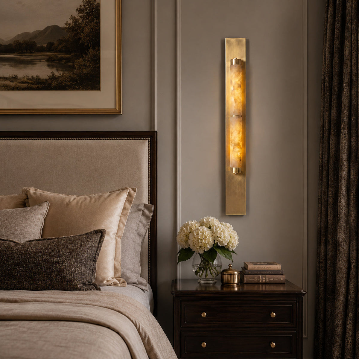 The wall lamp illuminating a dark entryway.