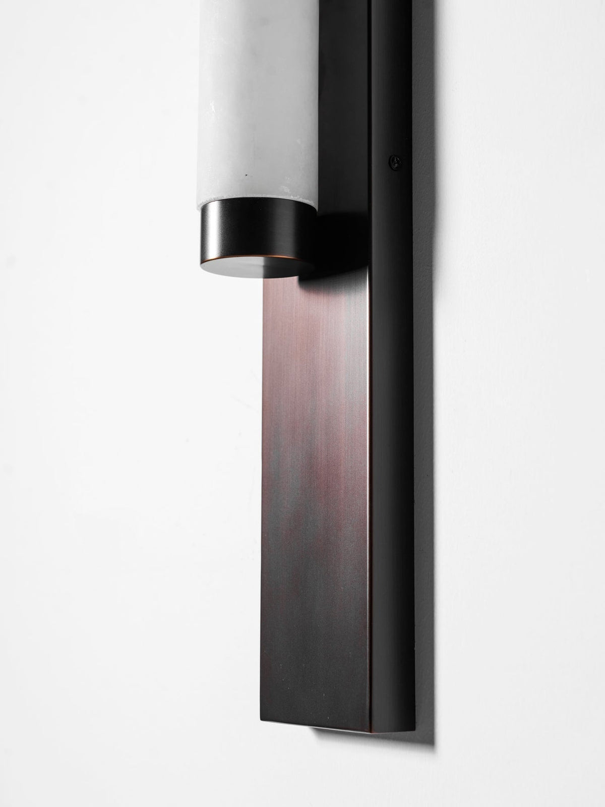 The Columnar Alabaster Wall Lamp with white finish.