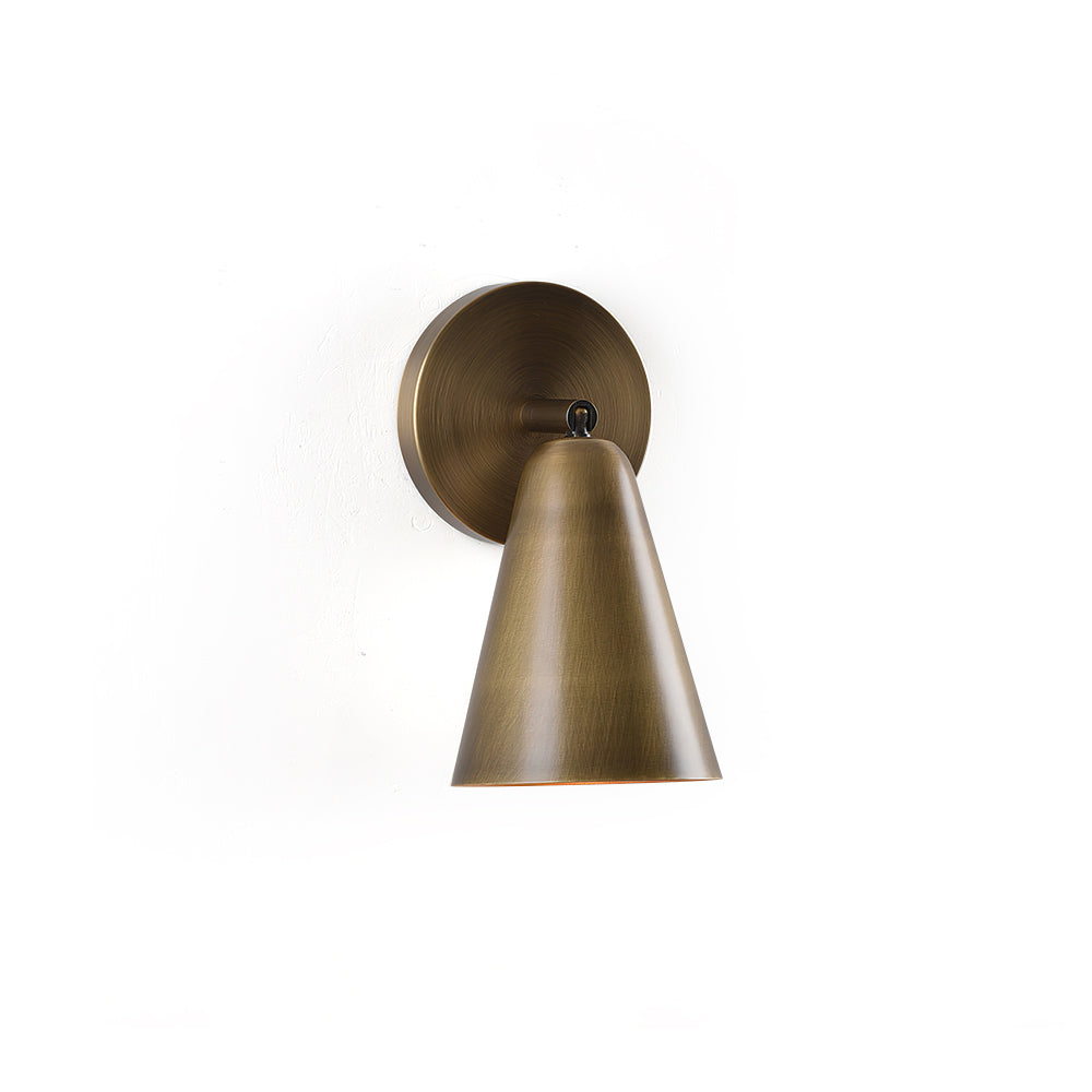 Donna Swivel Sconce in antique brass finish.