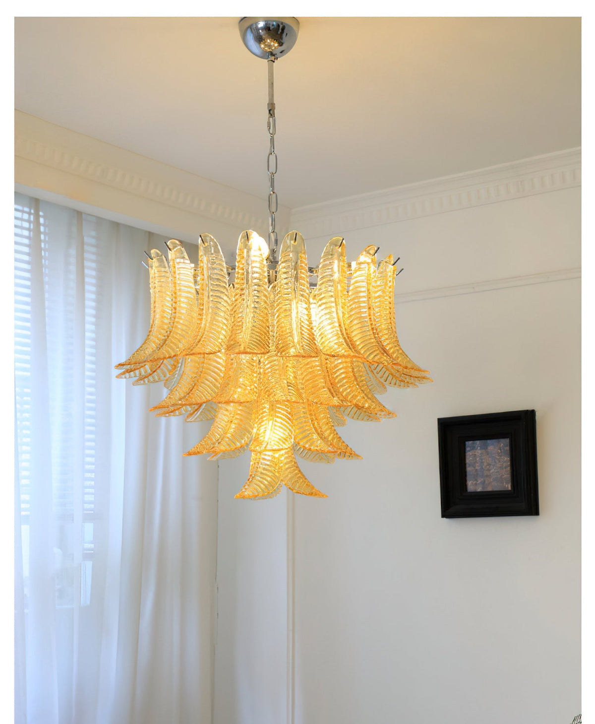 Clear glass version of the Eclissi Tiered Chandelier.