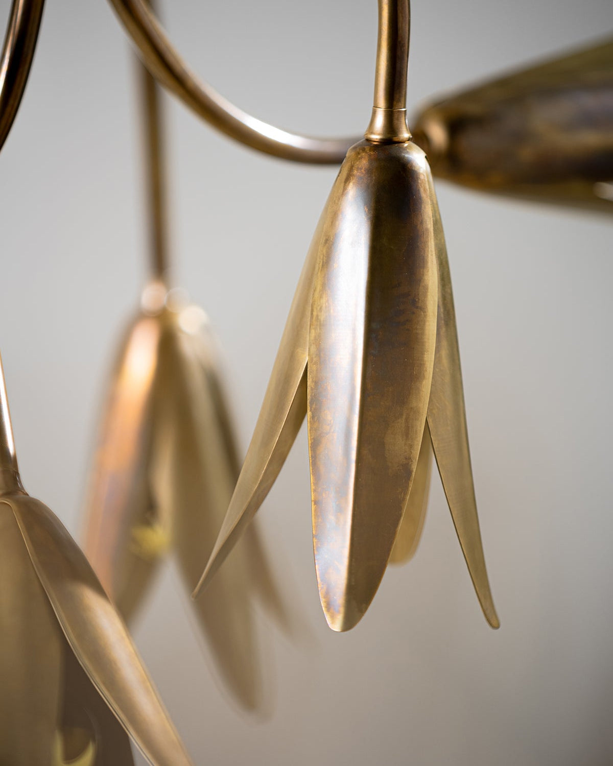 Lifestyle image of the Evadne Chandelier in a romantic living nook.