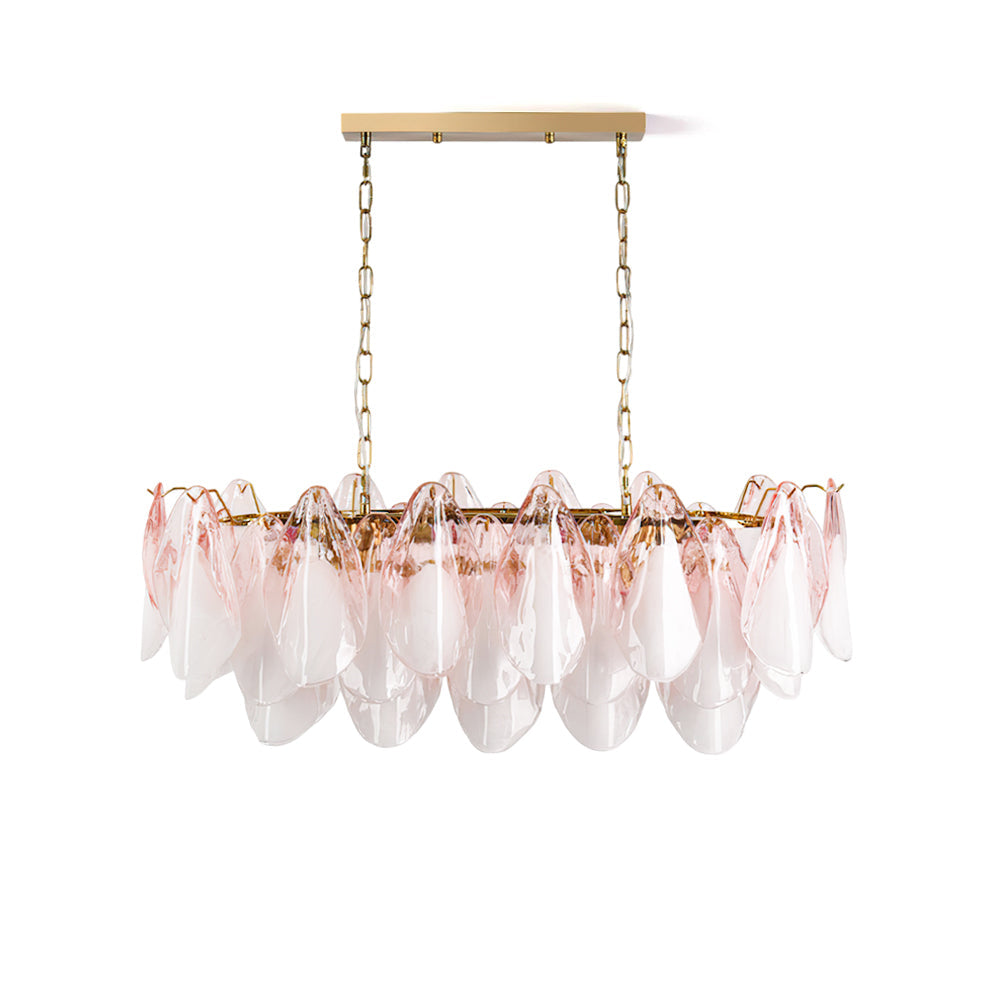 Flora Blush Ombre Linear Chandelier with pink glass leaves against a plain wall.