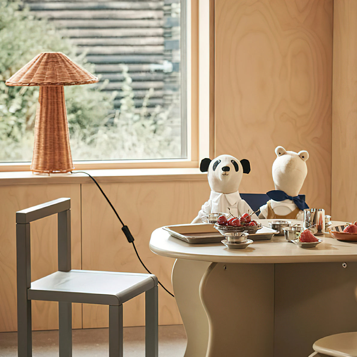 Side profile of the Freya Table Lamp, highlighting its tapered base and conical shade.