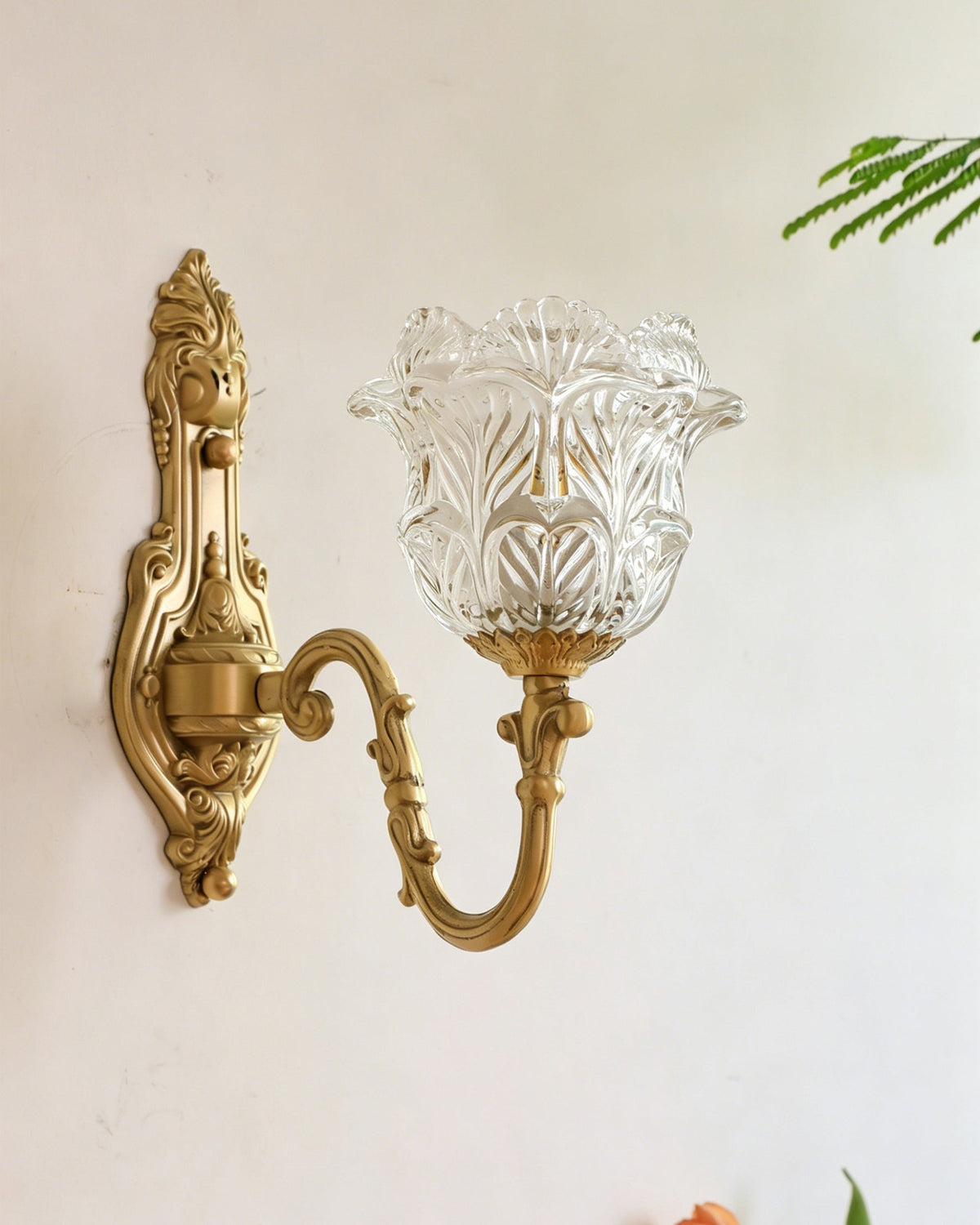 Close-up shot of the crown-shaped clear glass shade.