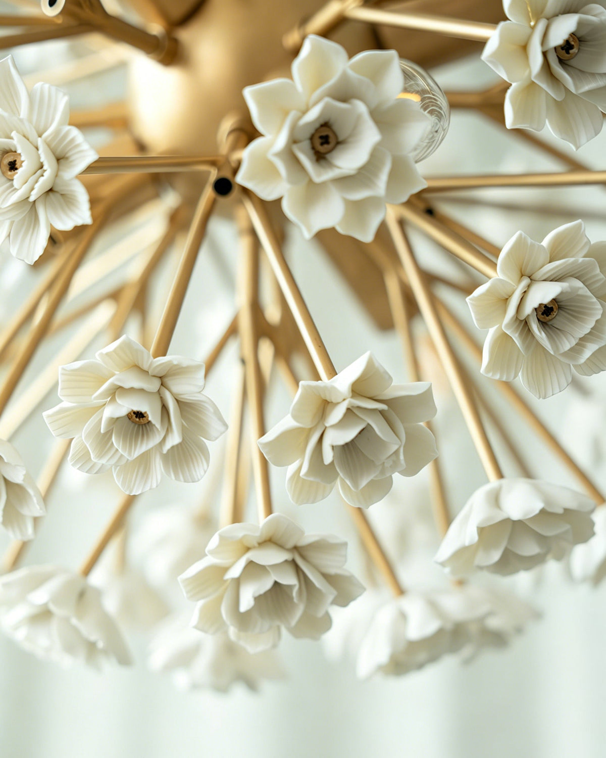 Gillian Chandelier hanging in a modern dining room setting.