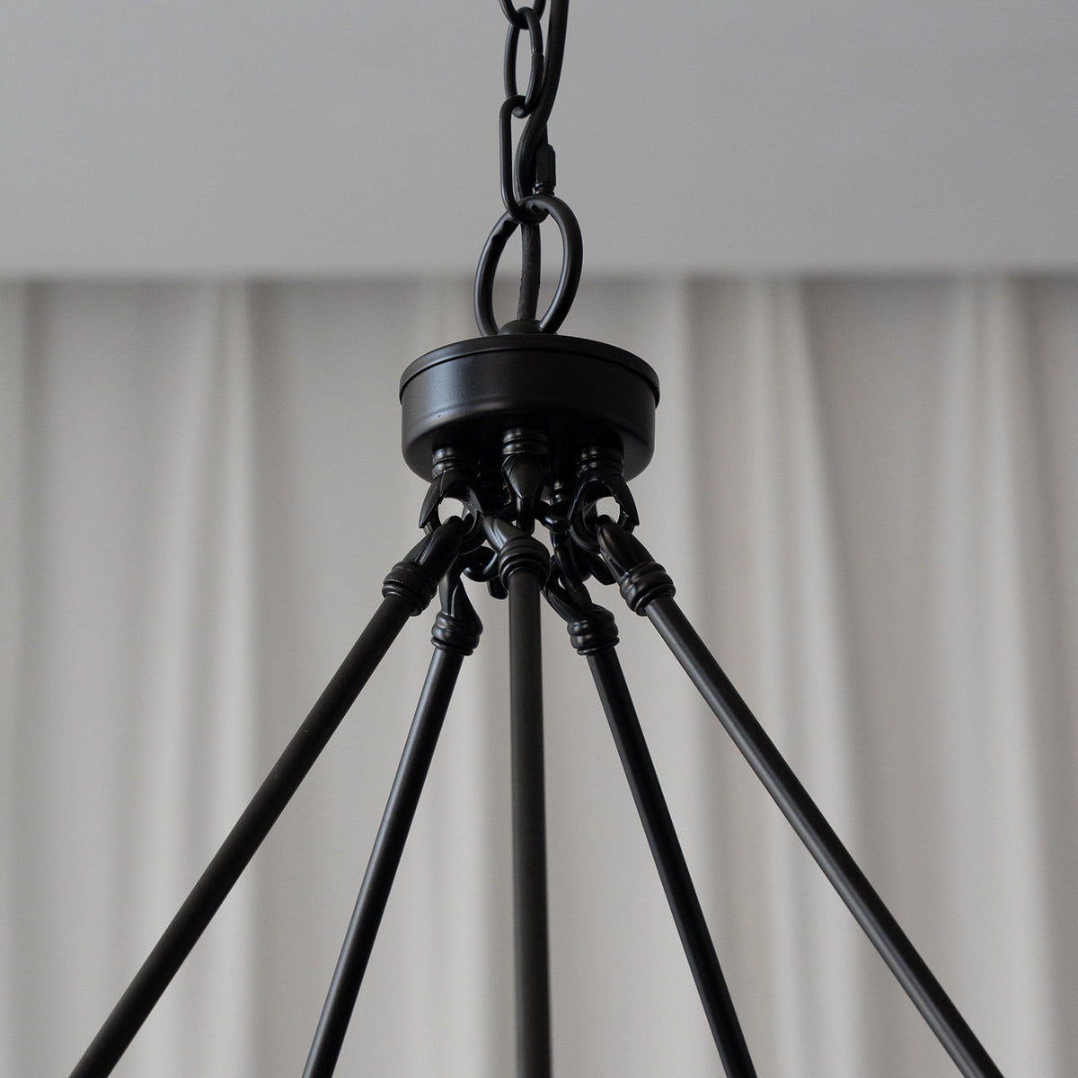 Hillsdale Wagon Wheel Chandelier, 10-head version, in a large living space.