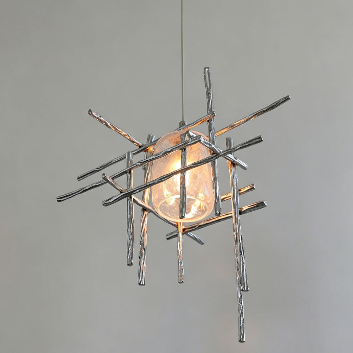 The Kova Pendant Light in smoky gray, unlit, against a white background.