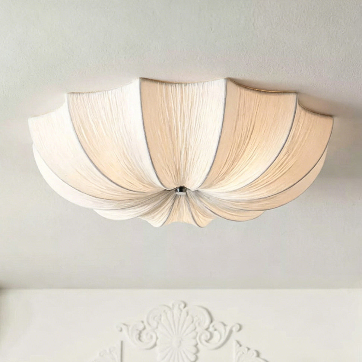 Close-up view of the hand-pleated fabric shade of the Margot Flush Mount.