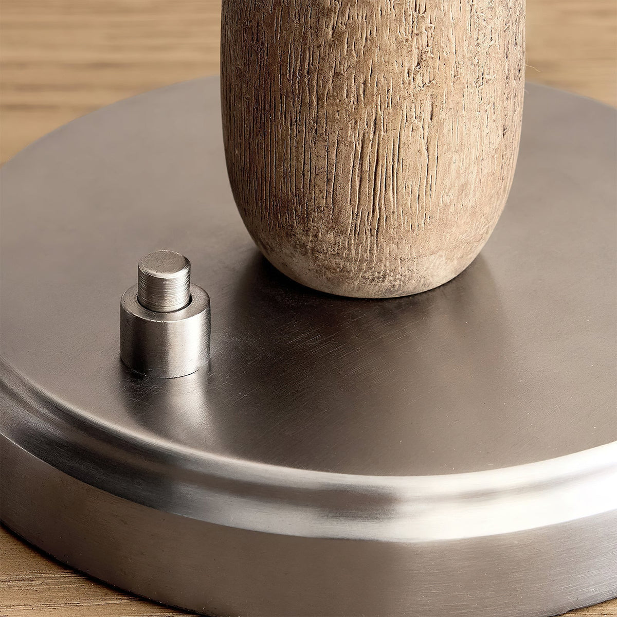 The Mitchell Table Lamp illuminating a workspace or desk.