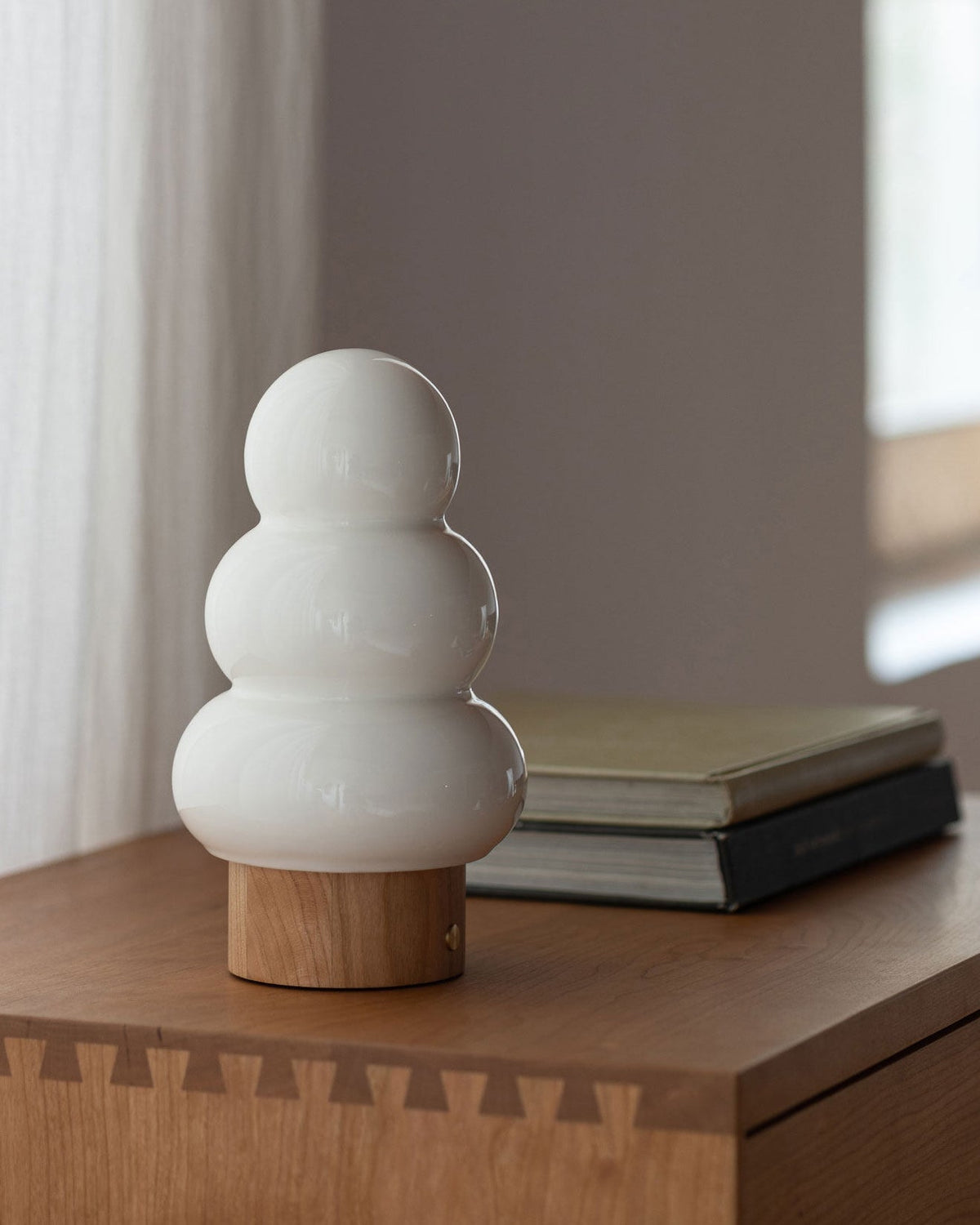 Orlo Table Lamp styled on a living room side table.