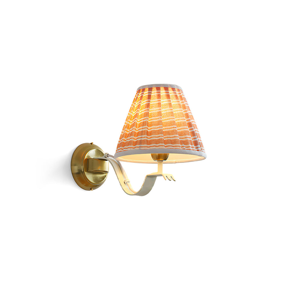 Penelope Pleated Wall Sconce with beige fabric shade.