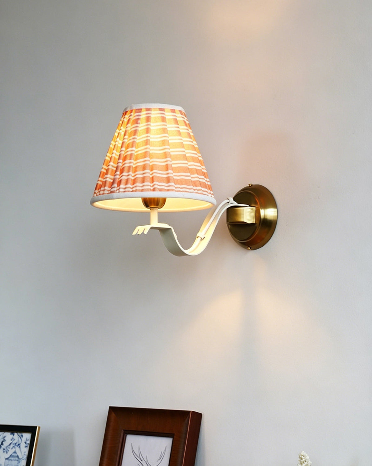 Another view of the sconce in a bedroom setting.