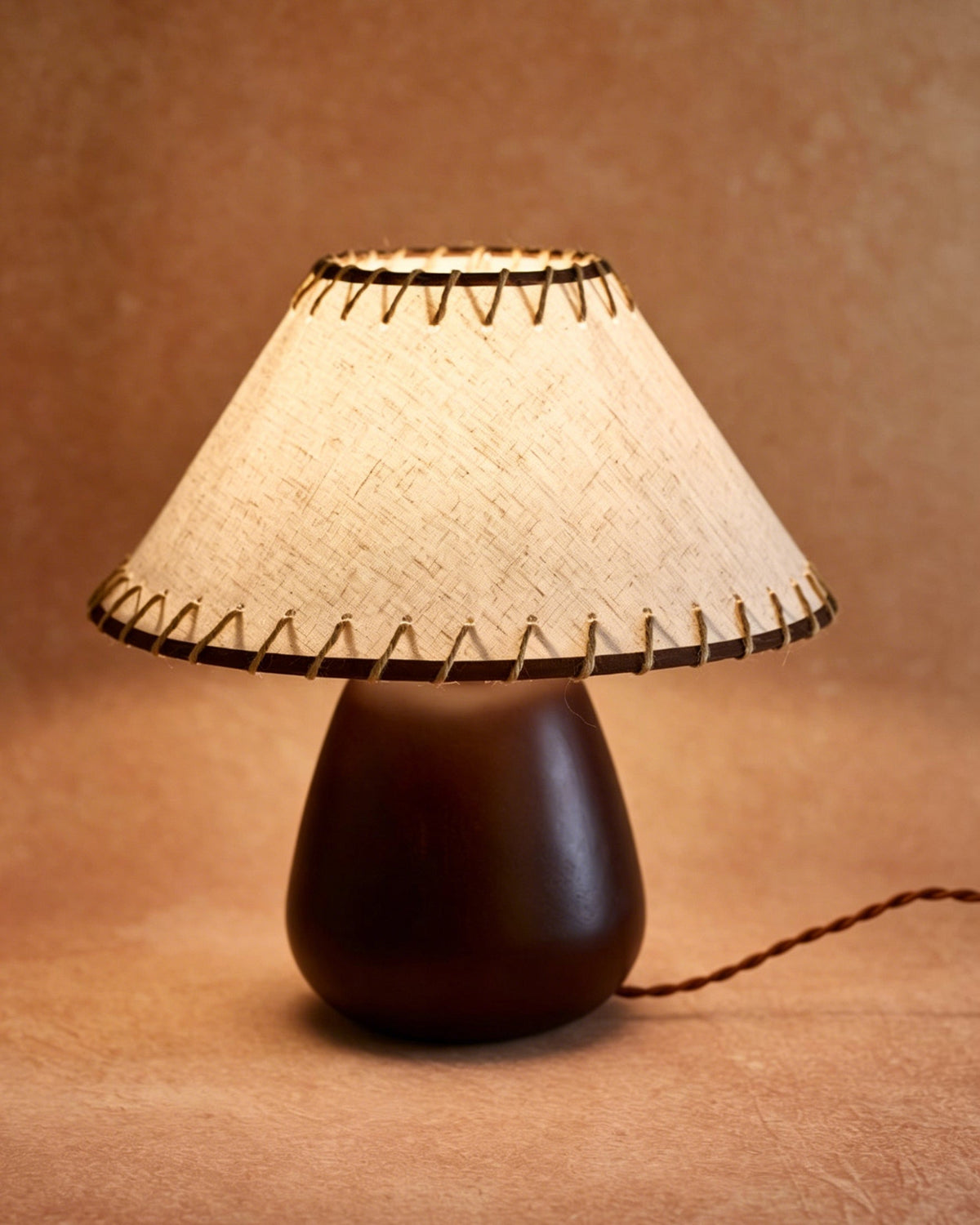 The table lamp used as a desk light in a contemporary home office.