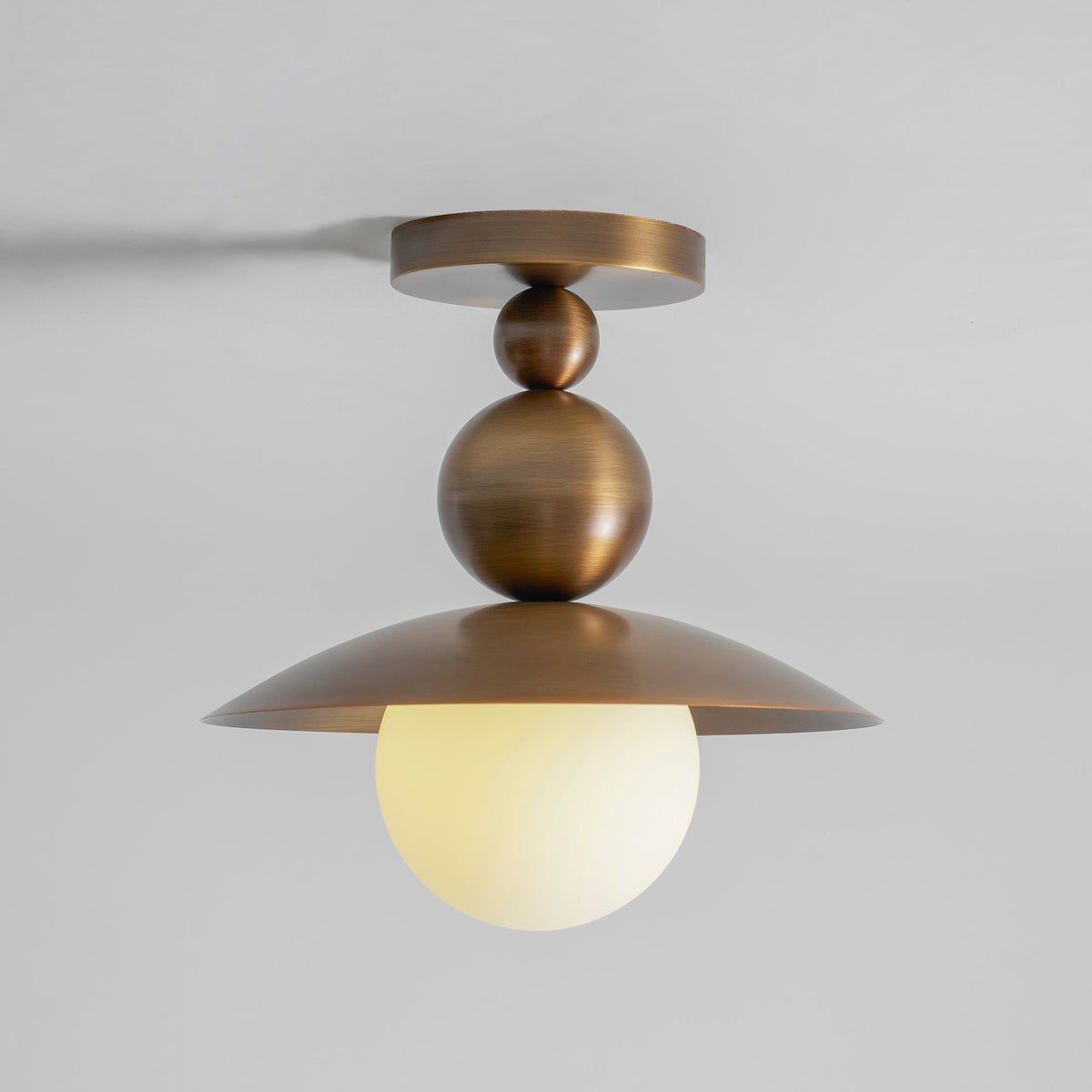 Comparison of the available finishes: antique brass, white, black, and nickel.
