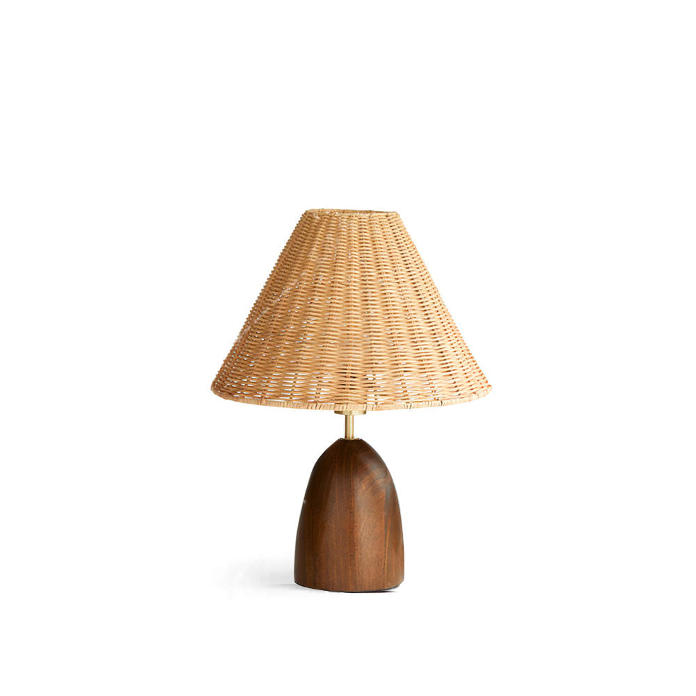 Suri Rattan Table Lamp with a cylindrical wood base and woven shade.