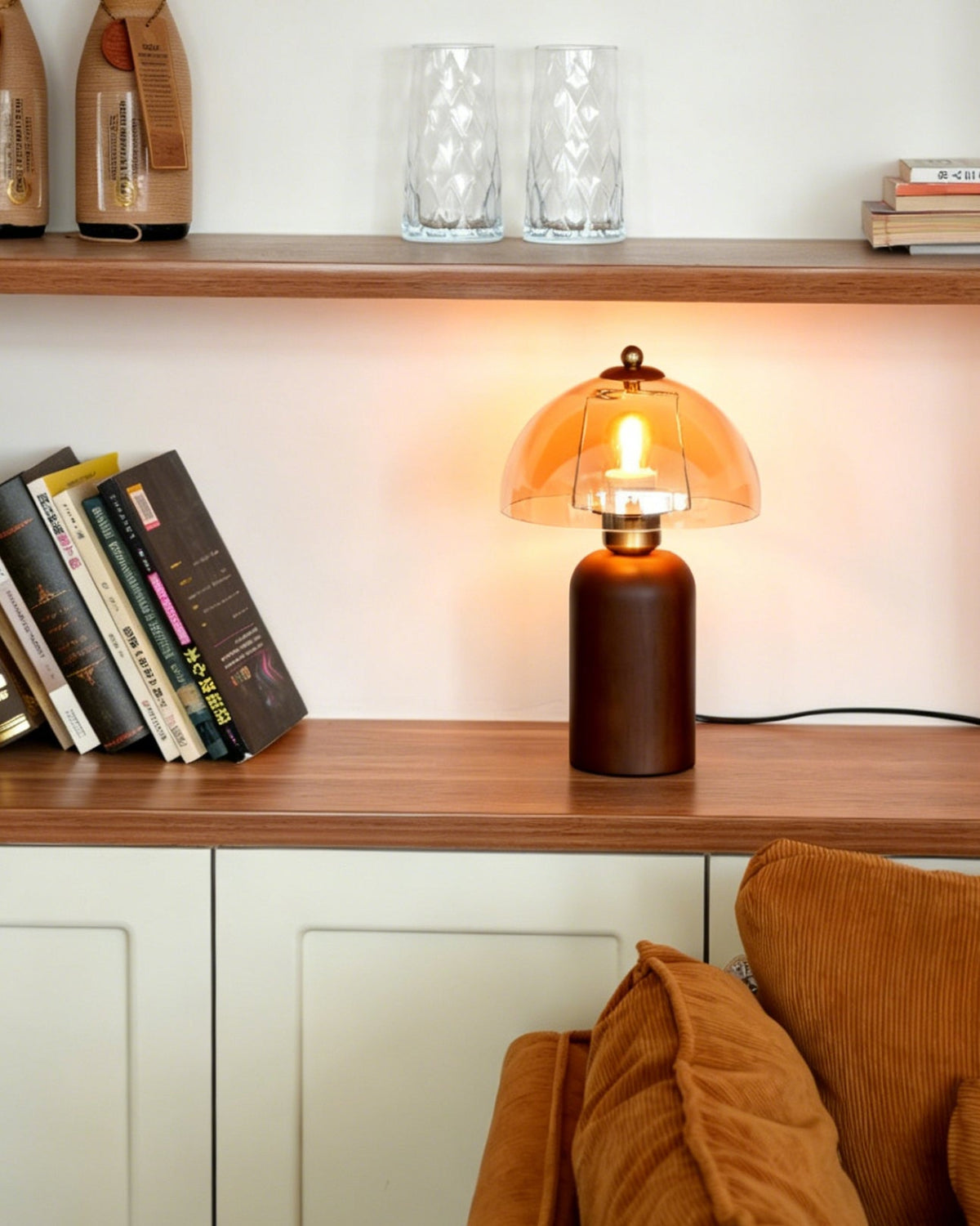 Close-up of the inline push-button switch on the lamp's black cord.