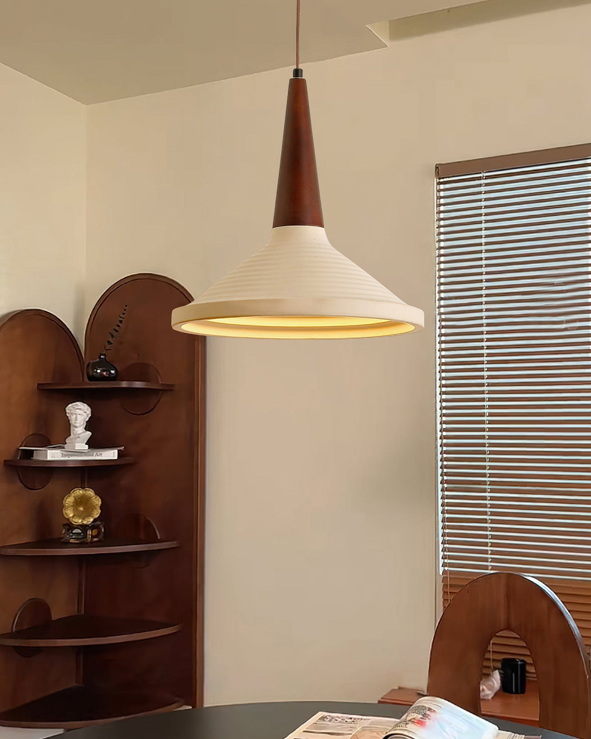Angled view of the tapered Doherty Pendant Light.