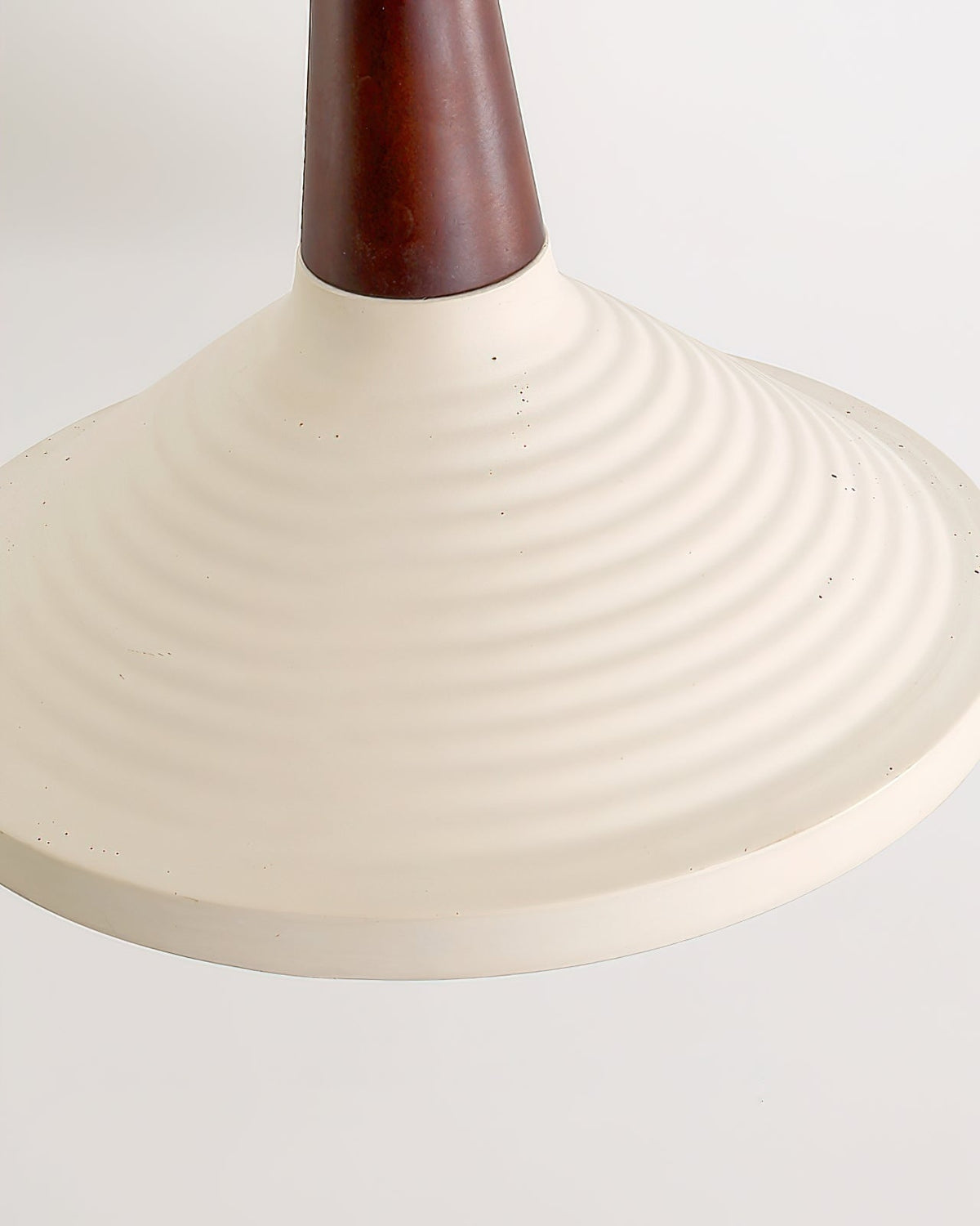 The walnut color Doherty Pendant Light over a home office desk.