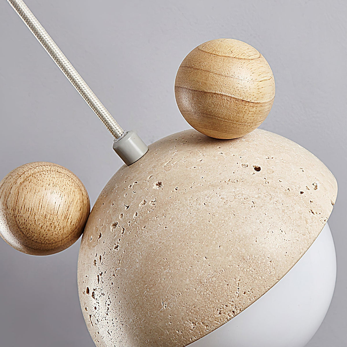 Lyraeus Suspension en Travertin Mickey