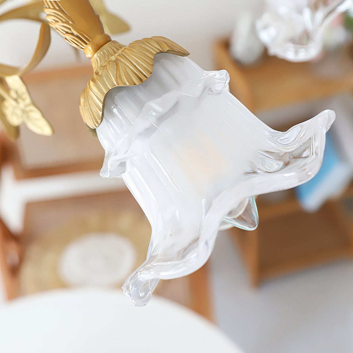 Dore Flower Chandelier against a light, airy background.
