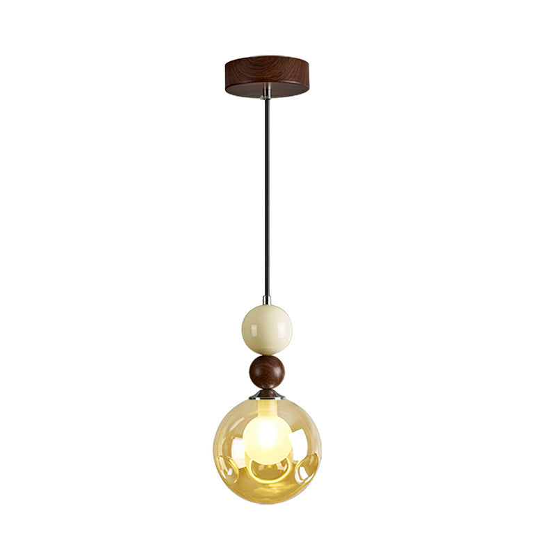Detail shot of the walnut-colored wood accent on the pendant light.
