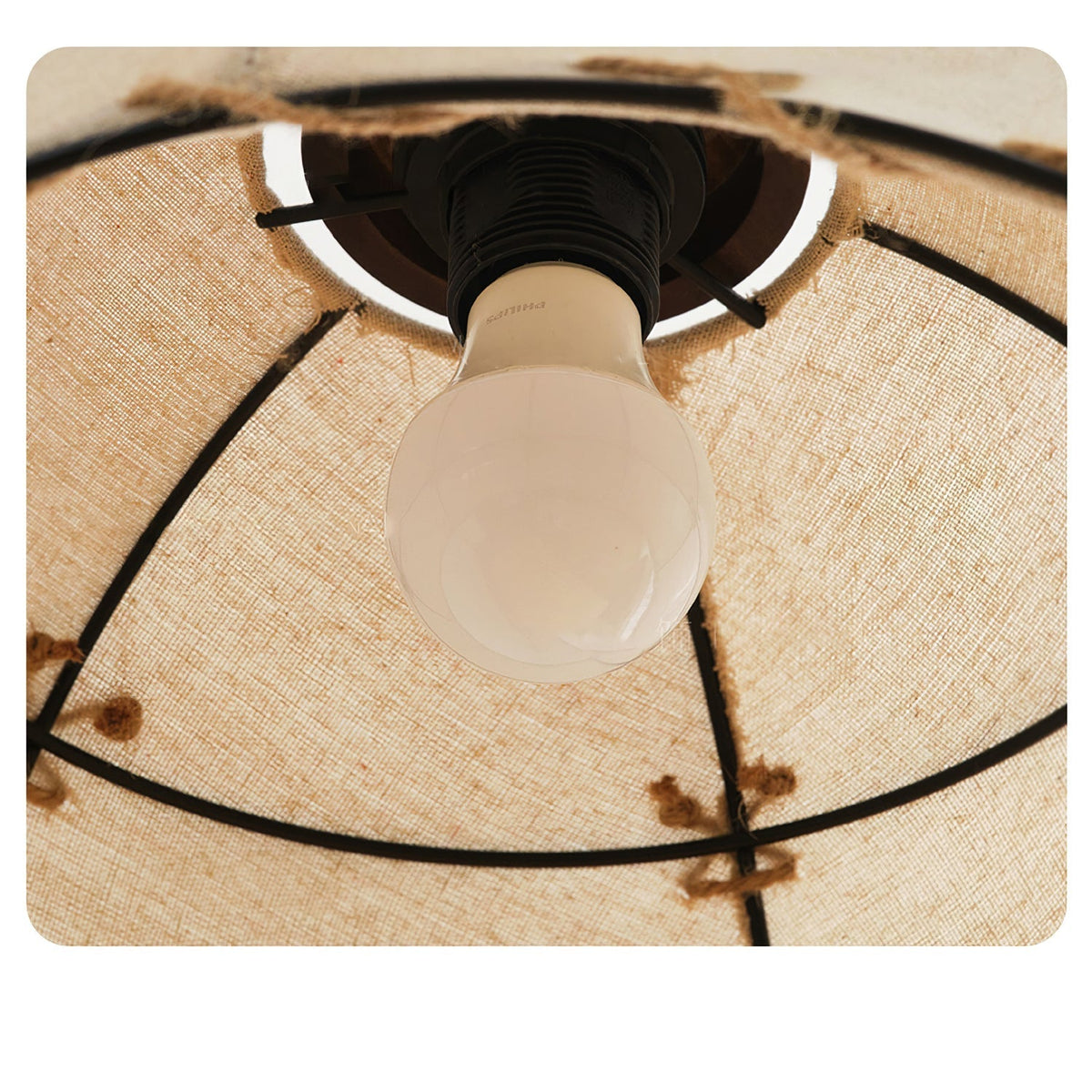 Side profile of the Duomo Pendant Light's beige fabric shade.