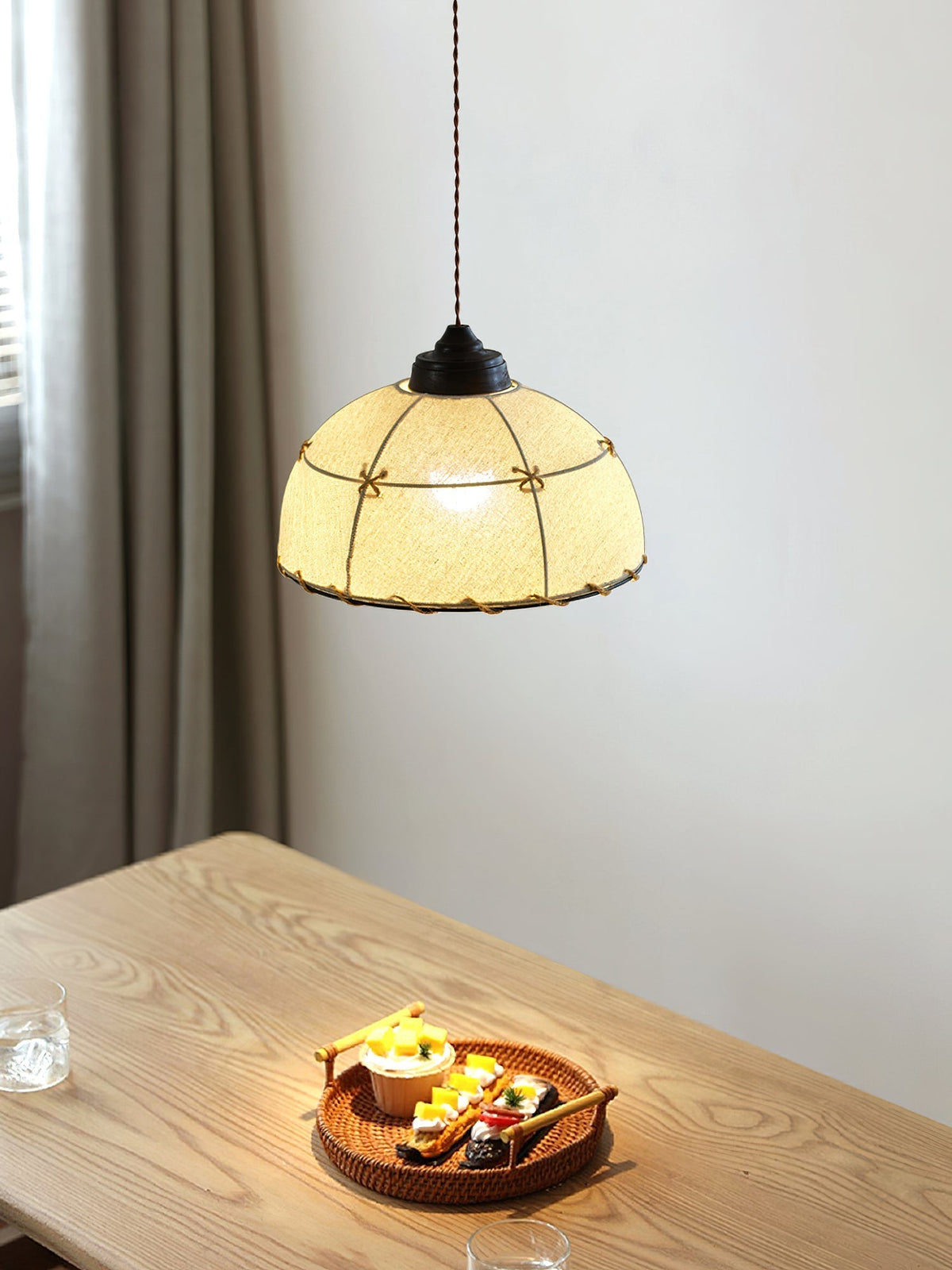 Linear Duomo Pendant Light with two beige fabric shades.