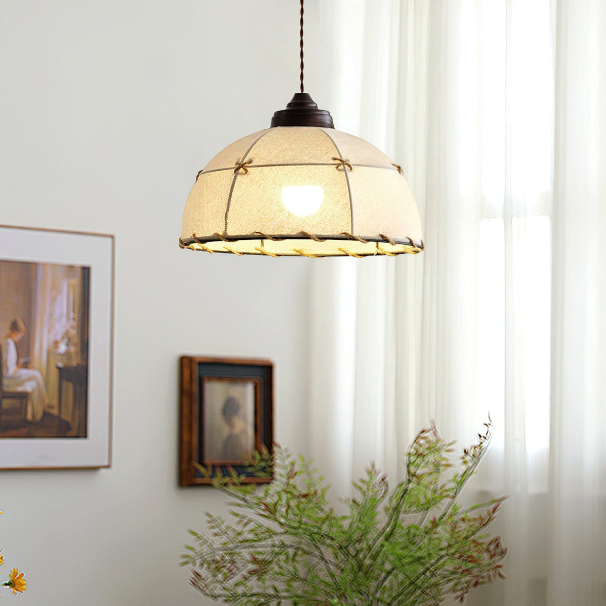 Close-up view of the Duomo Pendant Light's woven rope detail on the fabric shade.