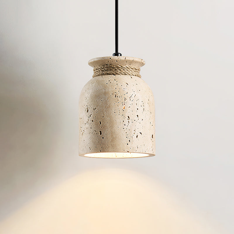 The Easton Pendant Lamp used as accent lighting in a cozy bedroom.