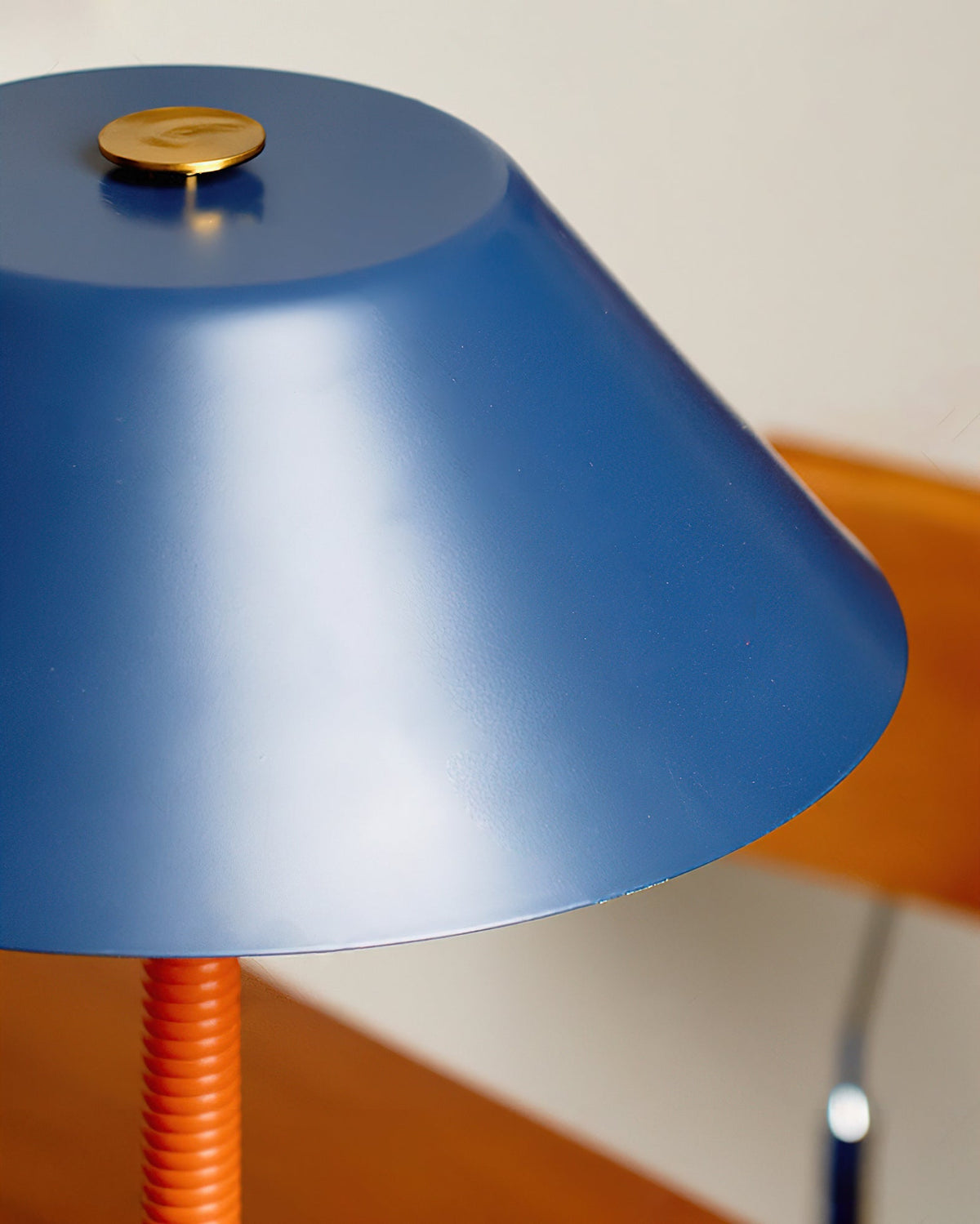 Eave Table Lamp in a styled room setting, providing ambient light.