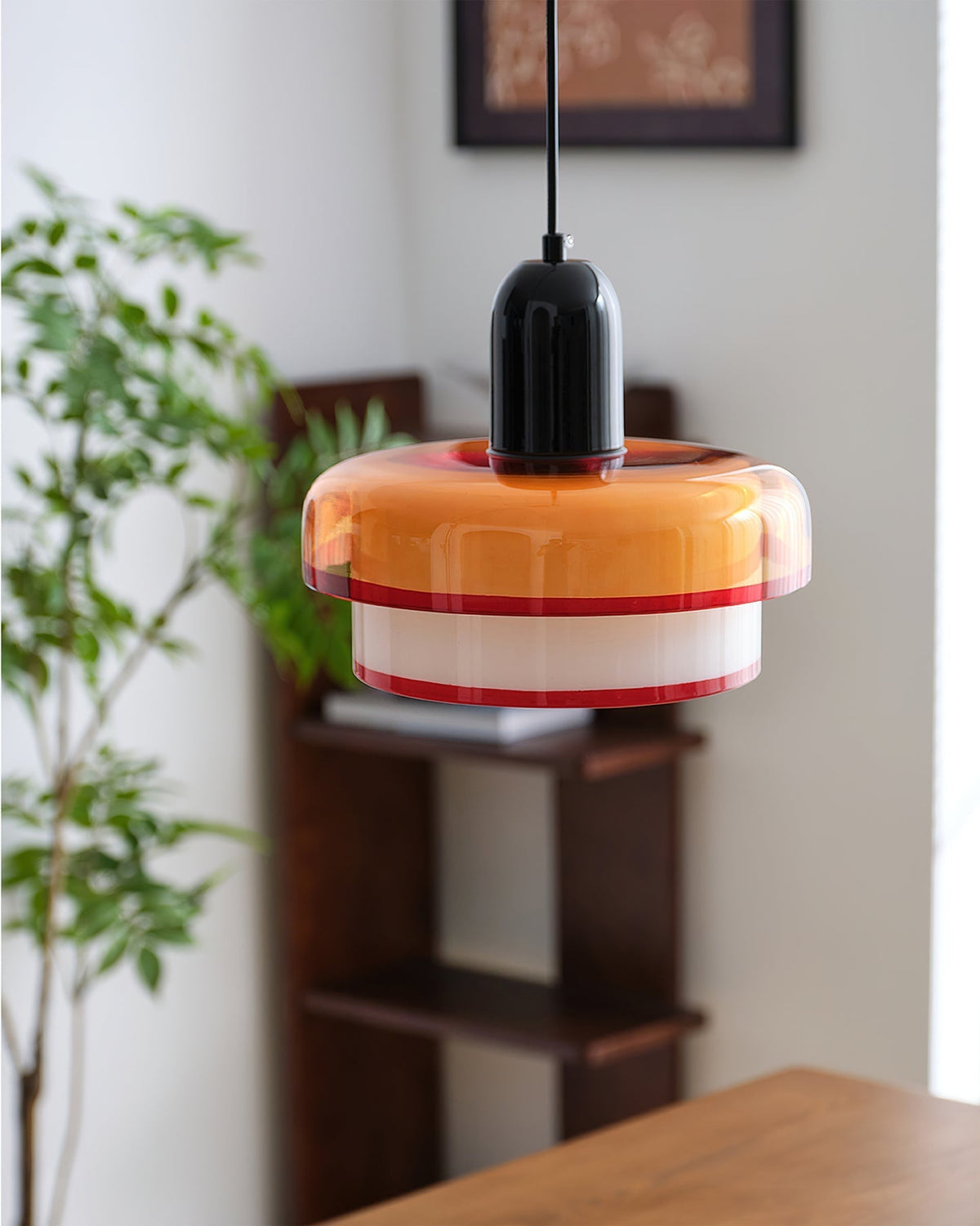 Ebern Pendant Light hanging in a modern kitchen setting.