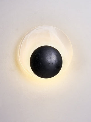 Orla Applique Murale en Coquille de Travertin Noir Cosmica Eclipse