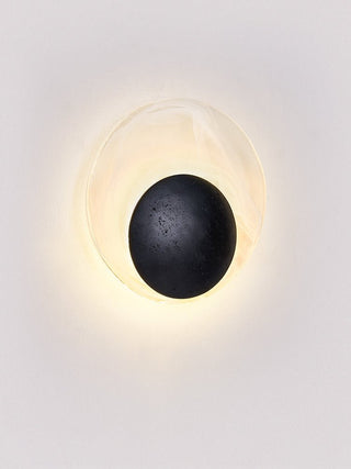 Orla Applique Murale en Coquille de Travertin Noir Cosmica Eclipse