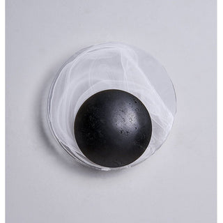 Orla Applique Murale en Coquille de Travertin Noir Cosmica Eclipse
