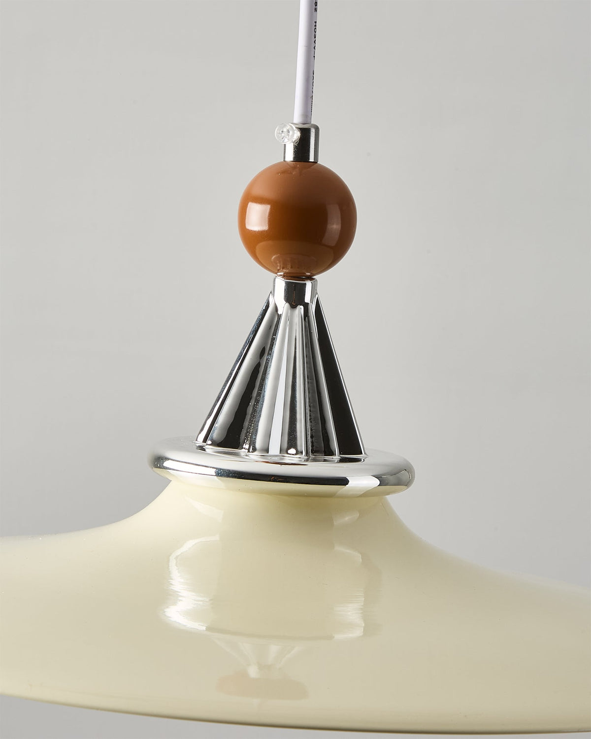 Angled view of the Walnut and Green pendant.