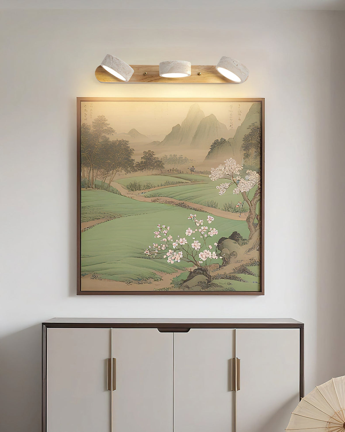 The 2-head Elias Travertine Wall Lamp, showcasing its compact size.