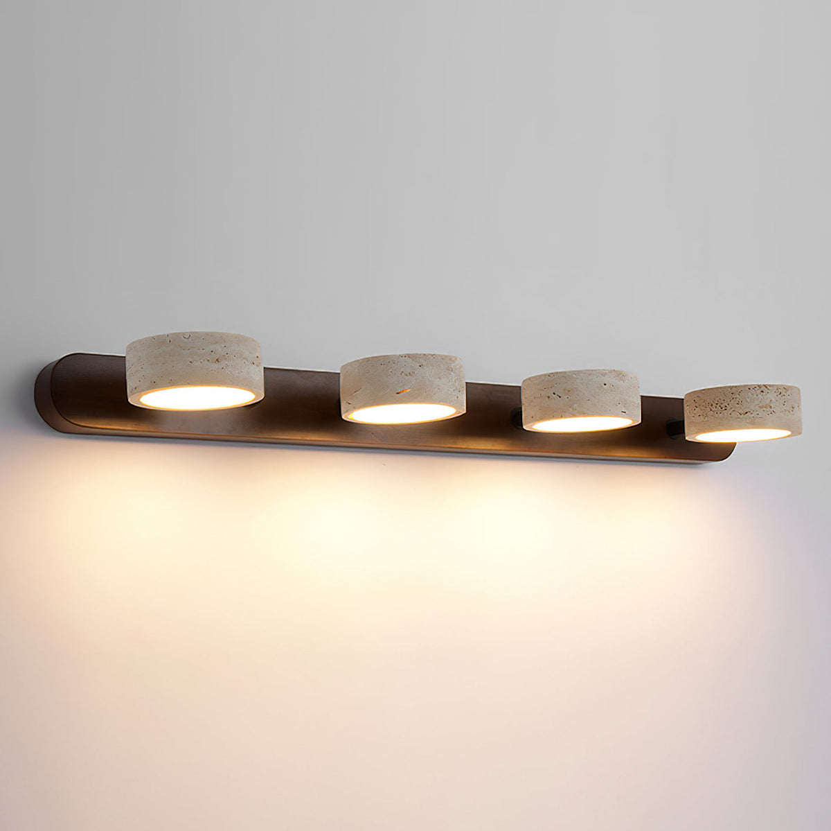 Elias Travertine Wall Lamp with cool kelvin light.