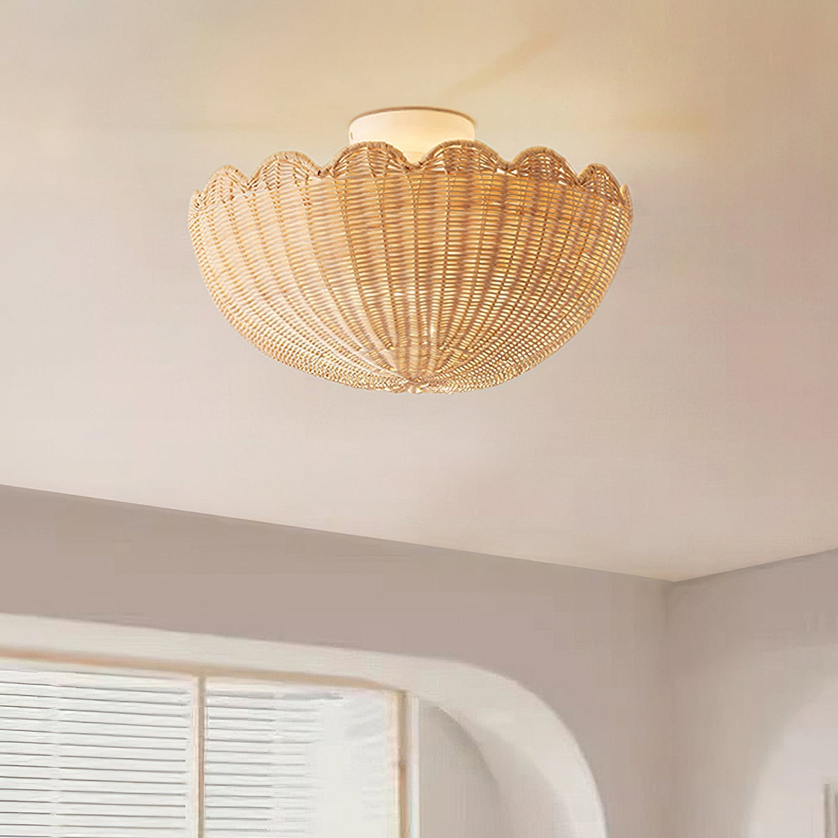 The Elior ceiling light hanging in a modern living room, providing warm ambient light.