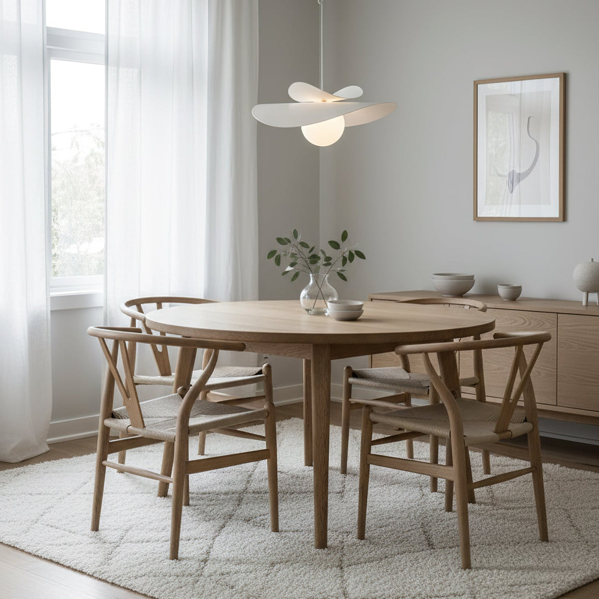 Close-up of the Fiksa Pendant Lamp's white metal ribbon design.