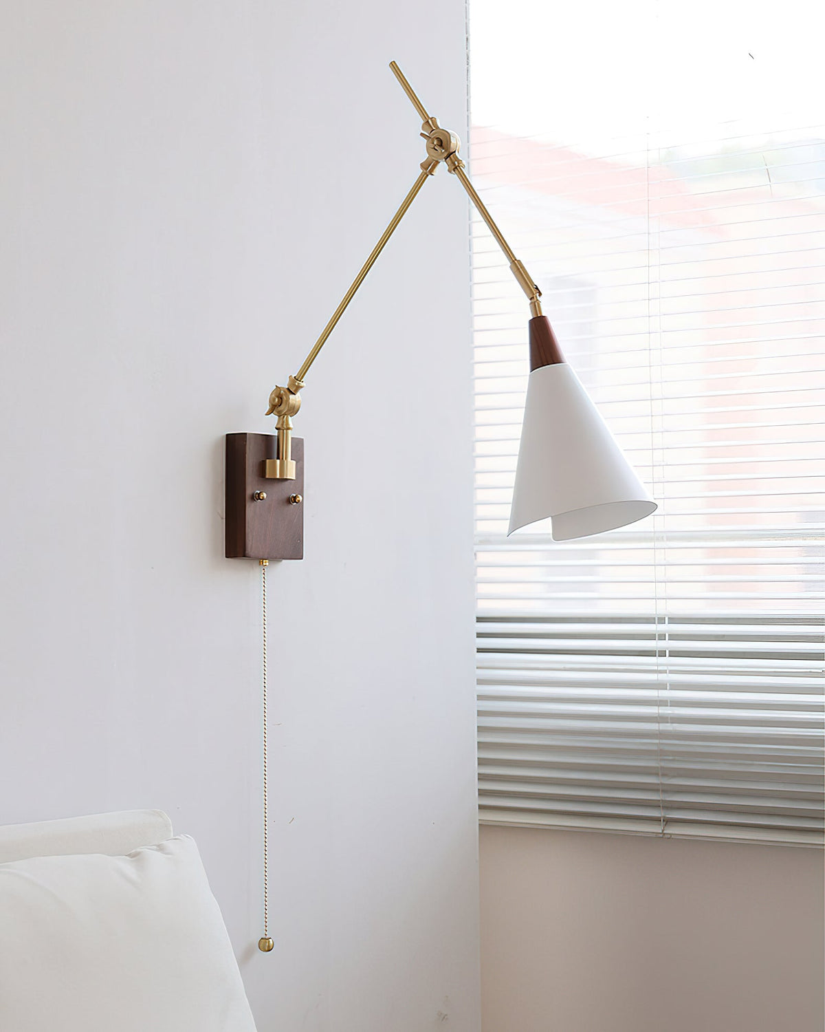 Side view of the Fleka Swing Arm Wall Lamp, highlighting its modern design.