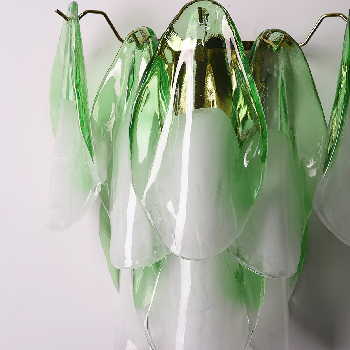 The different color options for the Foliage Wall Sconce: pink, green, white.