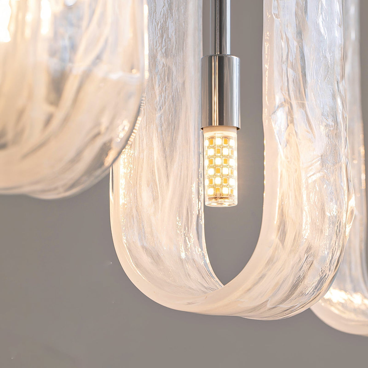 Side profile of the 19-light Fontaine Chandelier against a plain background.