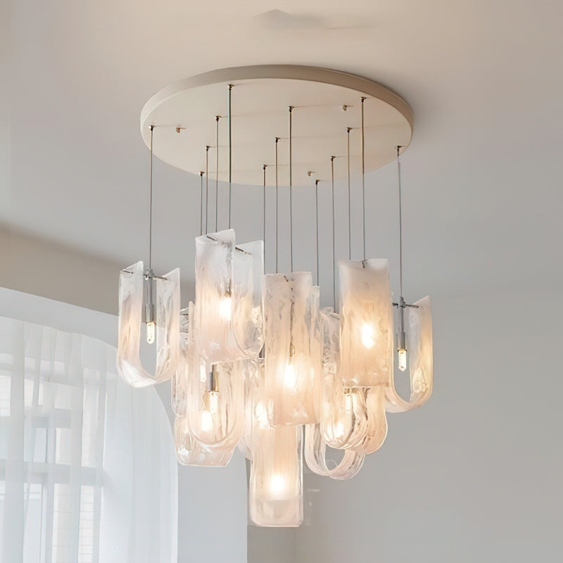 The Fontaine Chandelier as a centerpiece in a minimalist interior design.