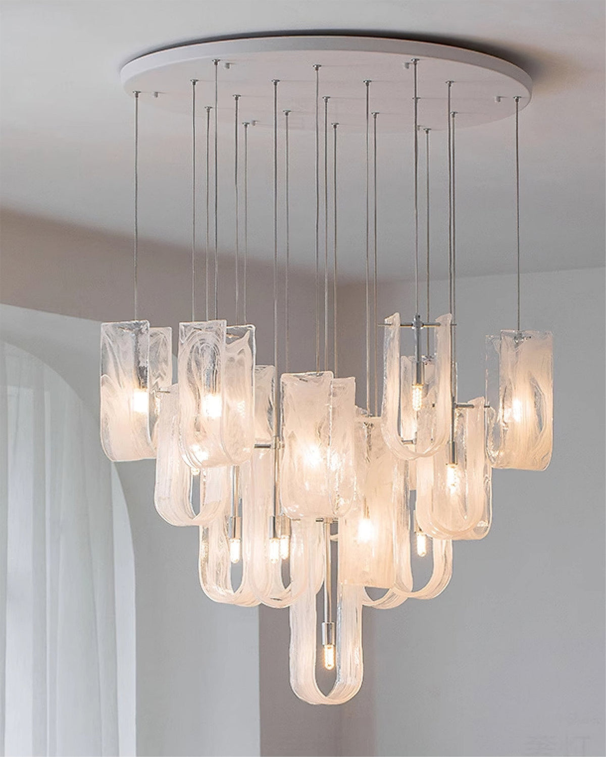 The ceiling mount and suspension wires of the Fontaine Chandelier.