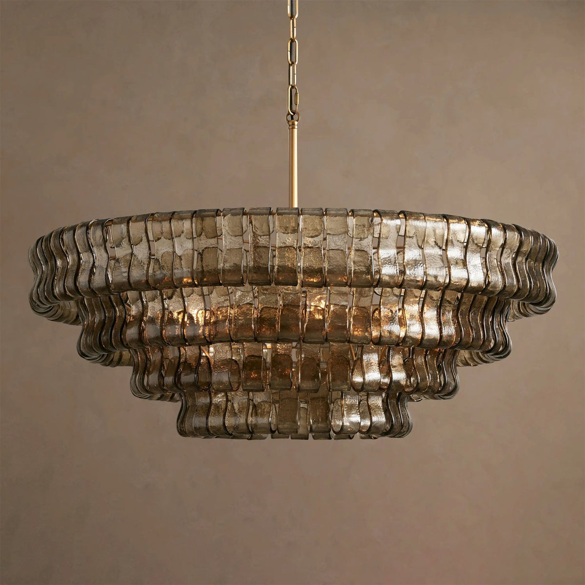 The Ghiaccio Chandelier in a principal suite with high ceilings.