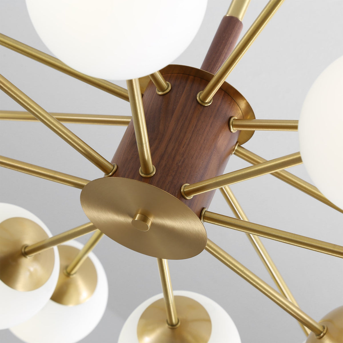 Gino Chandelier providing ambient lighting in a stylish bedroom.